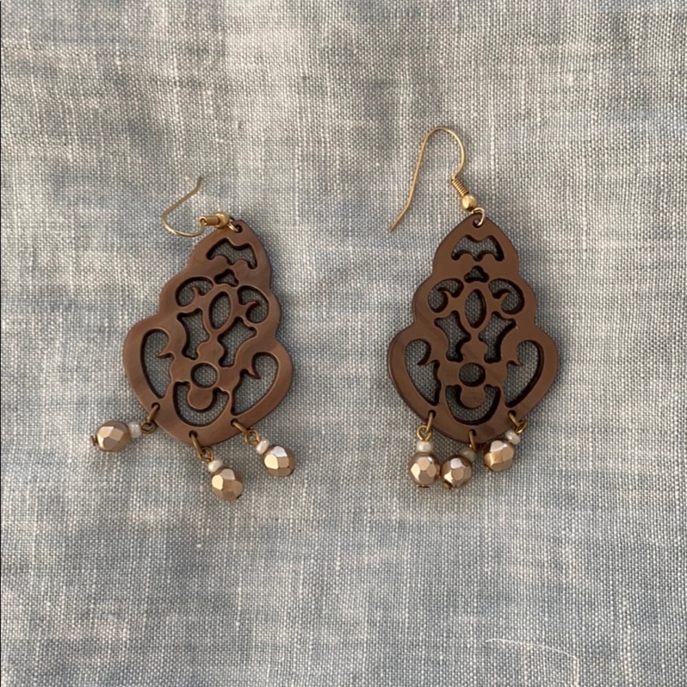 Plastic tigers eye dangling earrings